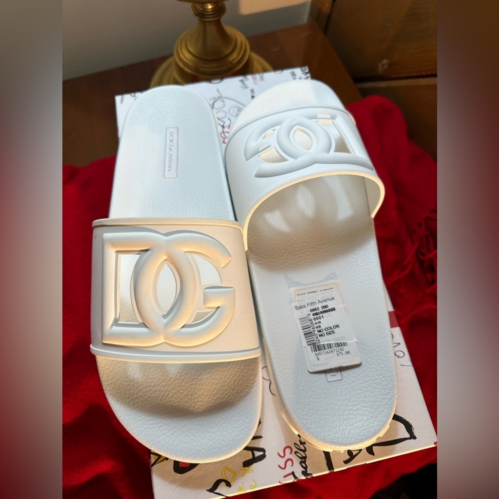 New Dolce & Gabbana sandals never used from Saks Fifth Ave. asking $275